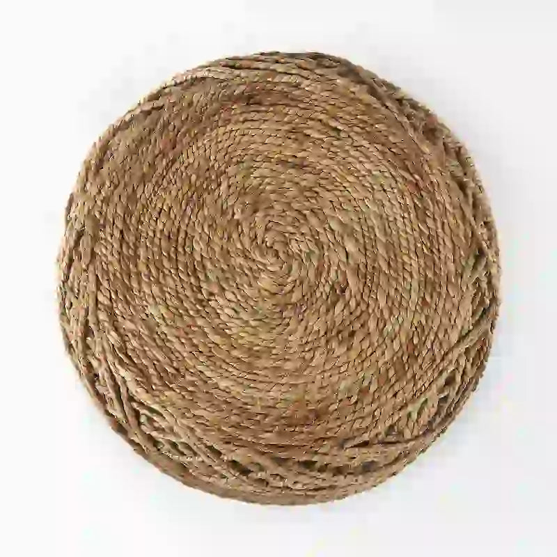 Coussin rond en laine tressée marron