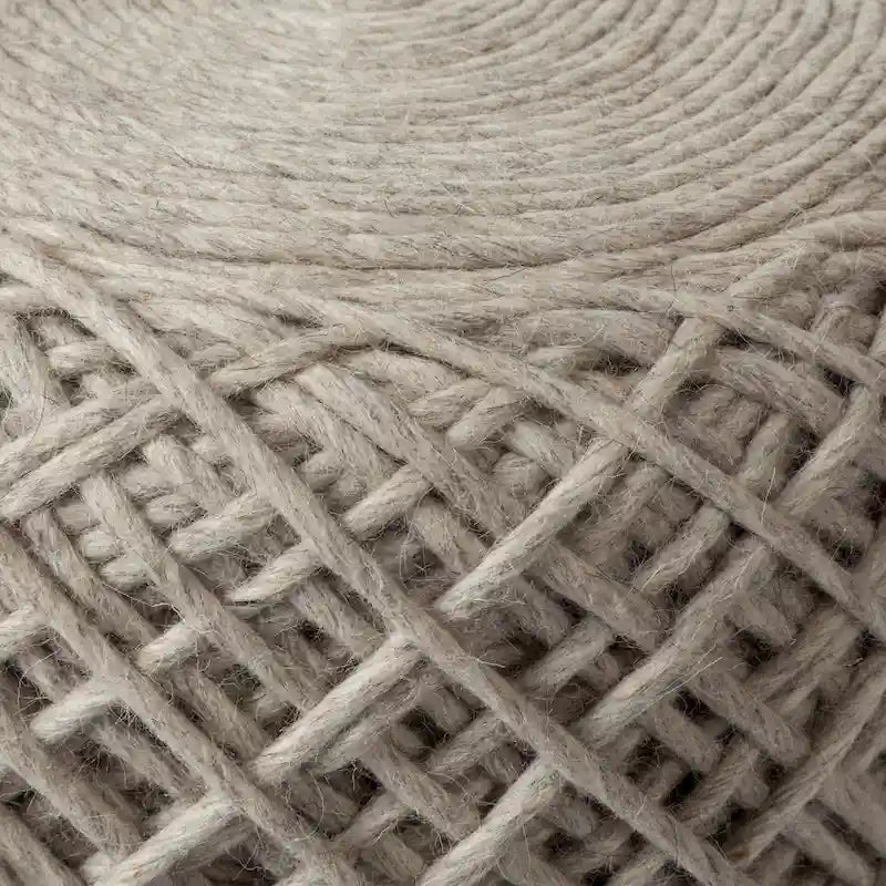 Coussin rond en laine tressée marron