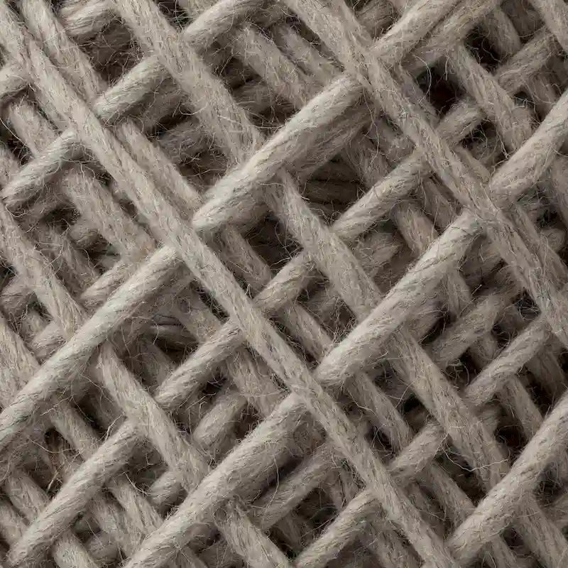 Coussin rond en laine tressée marron