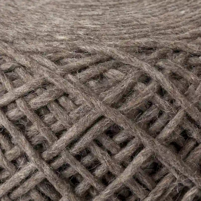 Coussin rond en laine tressée marron