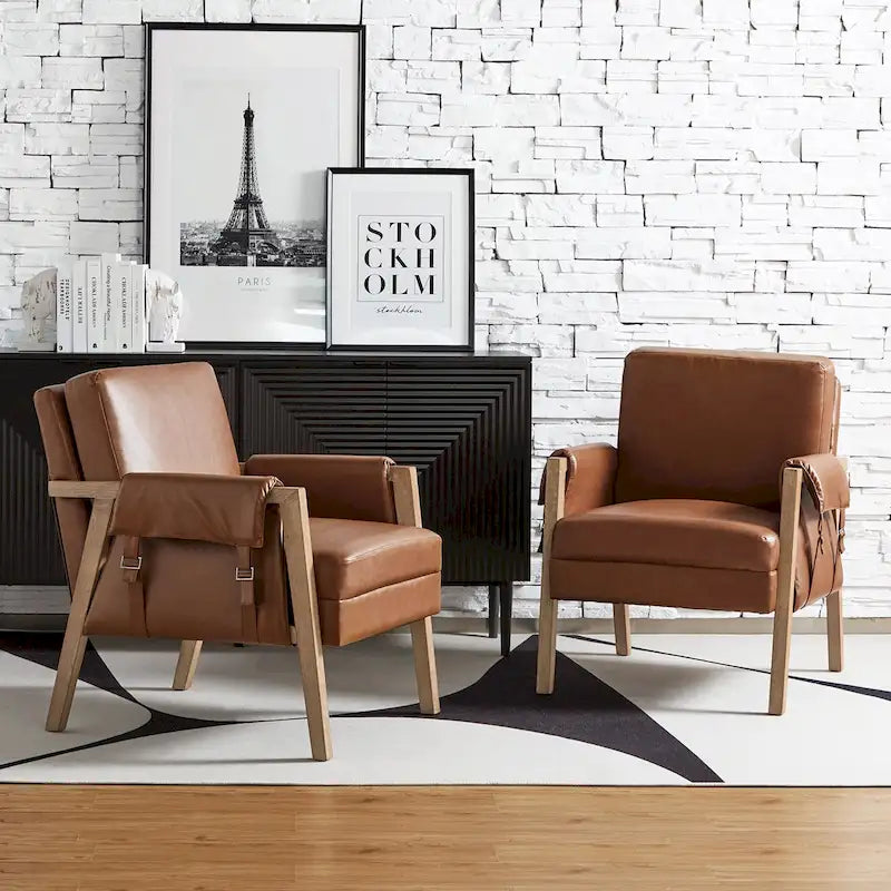 Fauteuils en similicuir style ferme avec pieds en bois massif, deux chaises par ensemble.